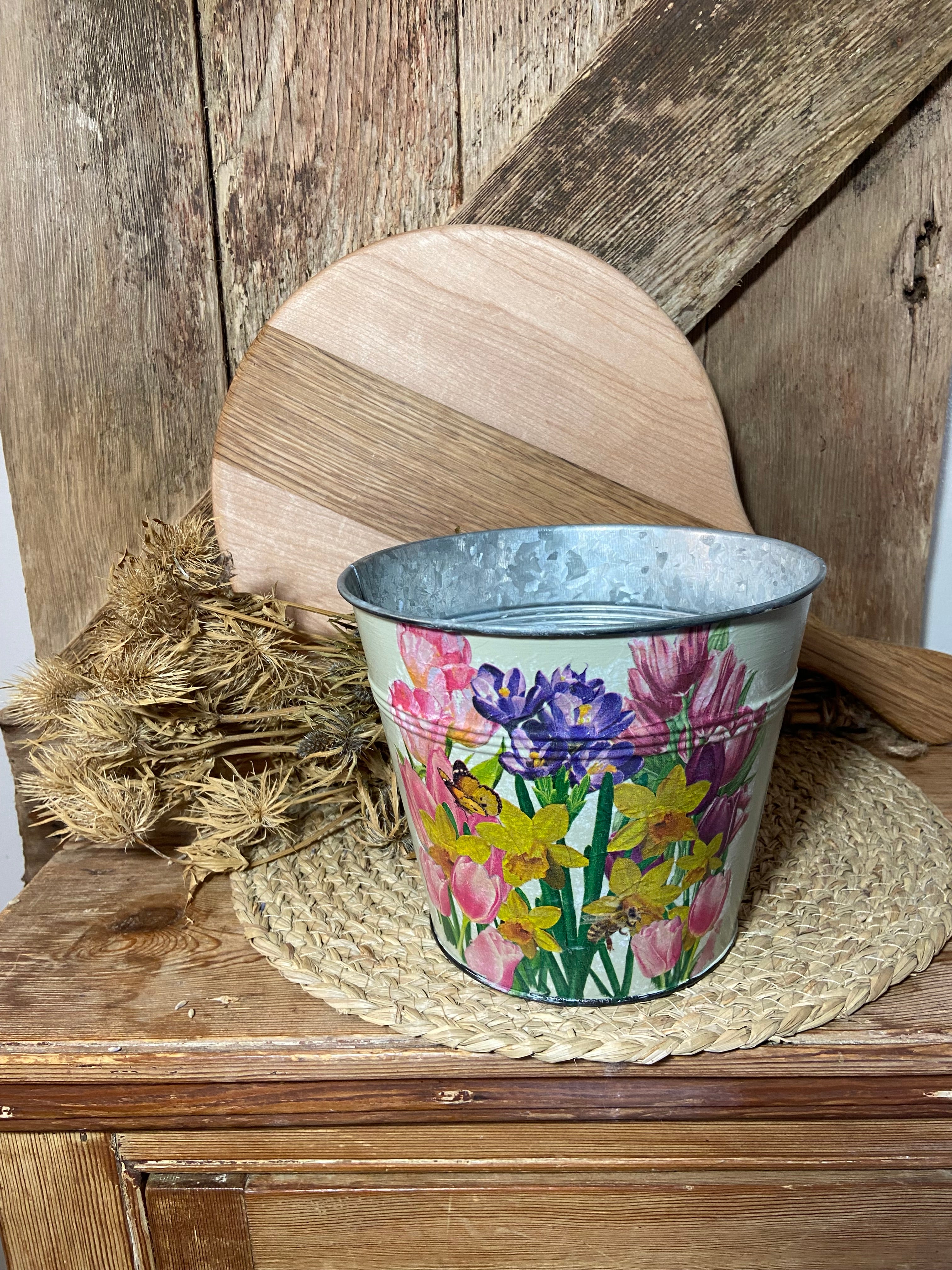 front shot spring flowers daffodil crocus tulip yellow pink blue metal planter cottage core home decor vintage floral mothers day birthday