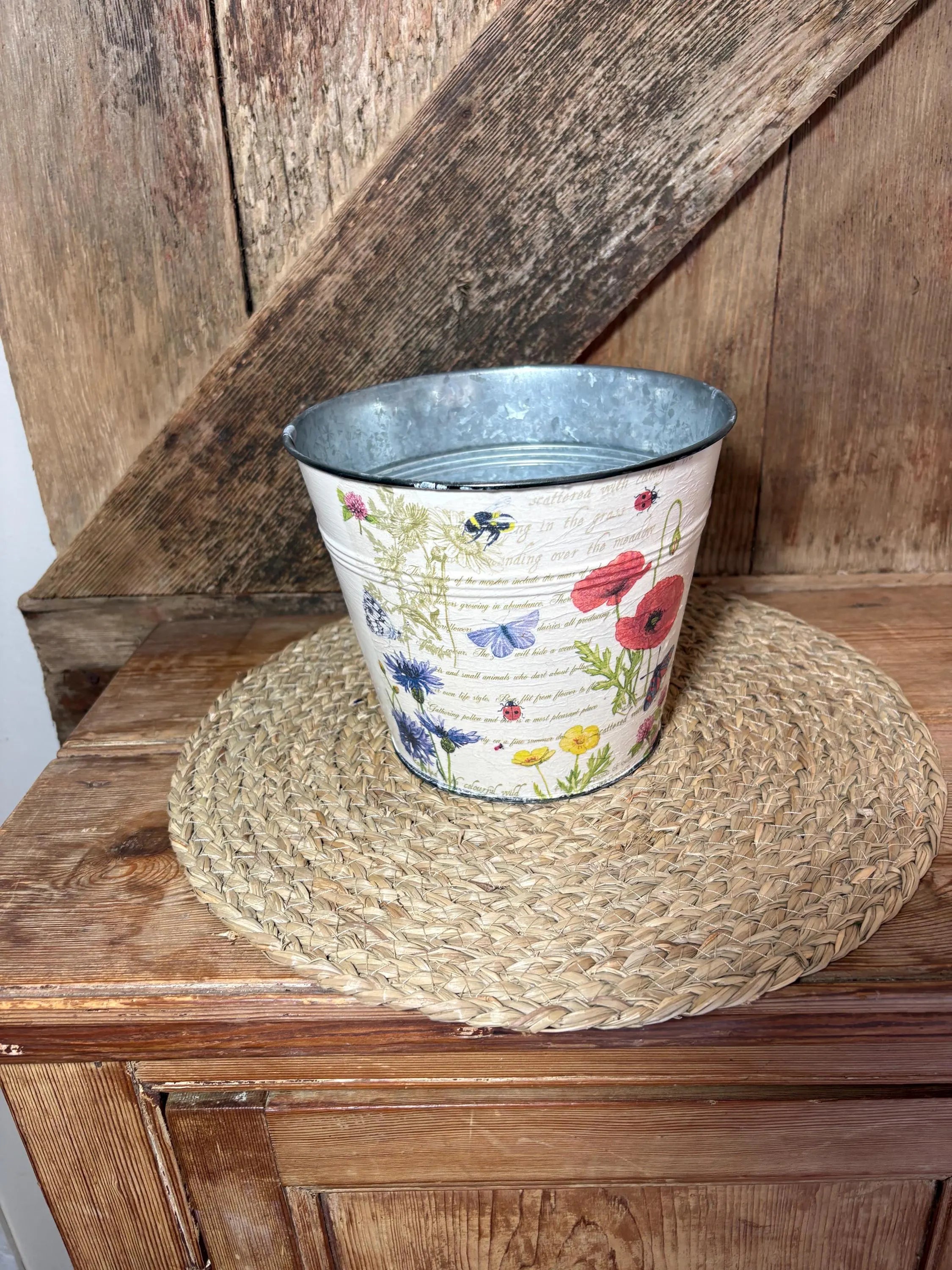 front shot poppy planter red blue yellow cream metal planter cottage core home decor vintage floral birthday wedding