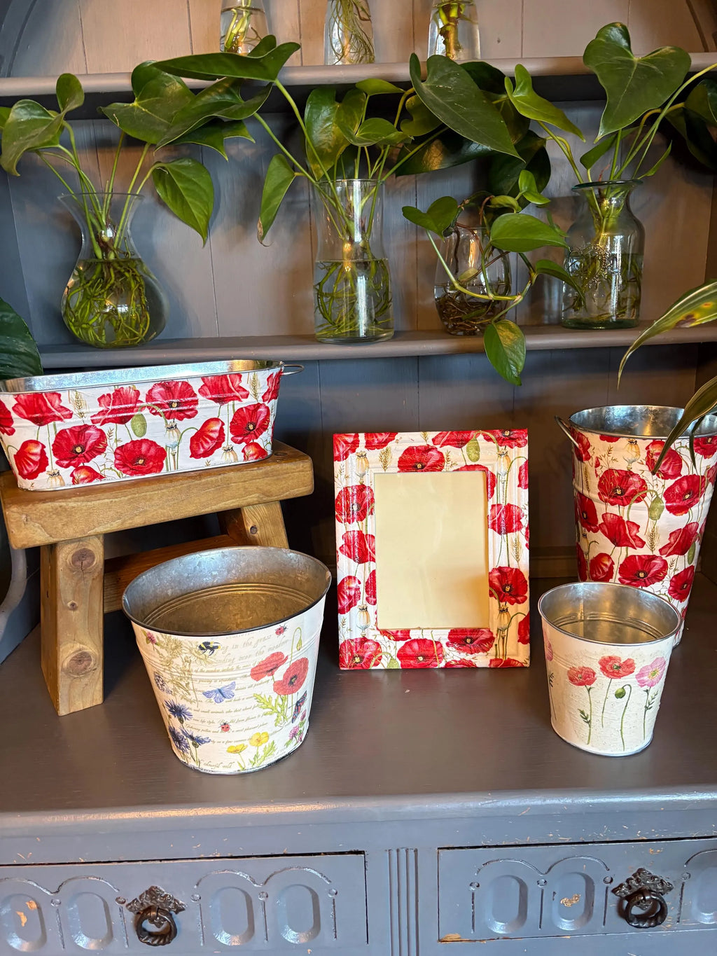 group shot metal planter poppy red white photo frame cottage core home decor vintage floral birthday wedding